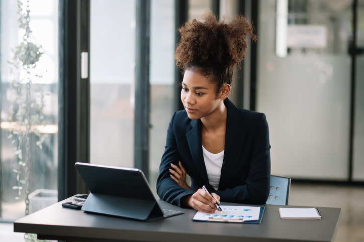 A financial advisor reviewing the results of her marketing plan.