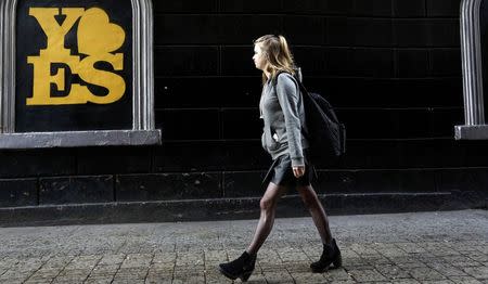 A poster supporting the Yes vote is displayed in the Dame street area of Dublin in Ireland May 19, 2015. REUTERS/Cathal McNaughton