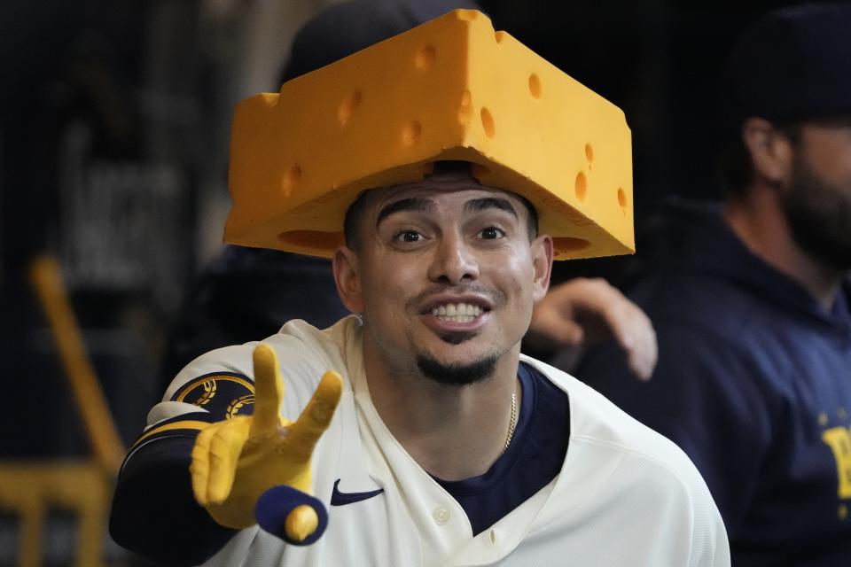 Milwaukee Brewers' Willy Adames celebrates after hitting a two-run home run during the first inning of a baseball game against the Houston Astros Wednesday, May 24, 2023, in Milwaukee. (AP Photo/Morry Gash)