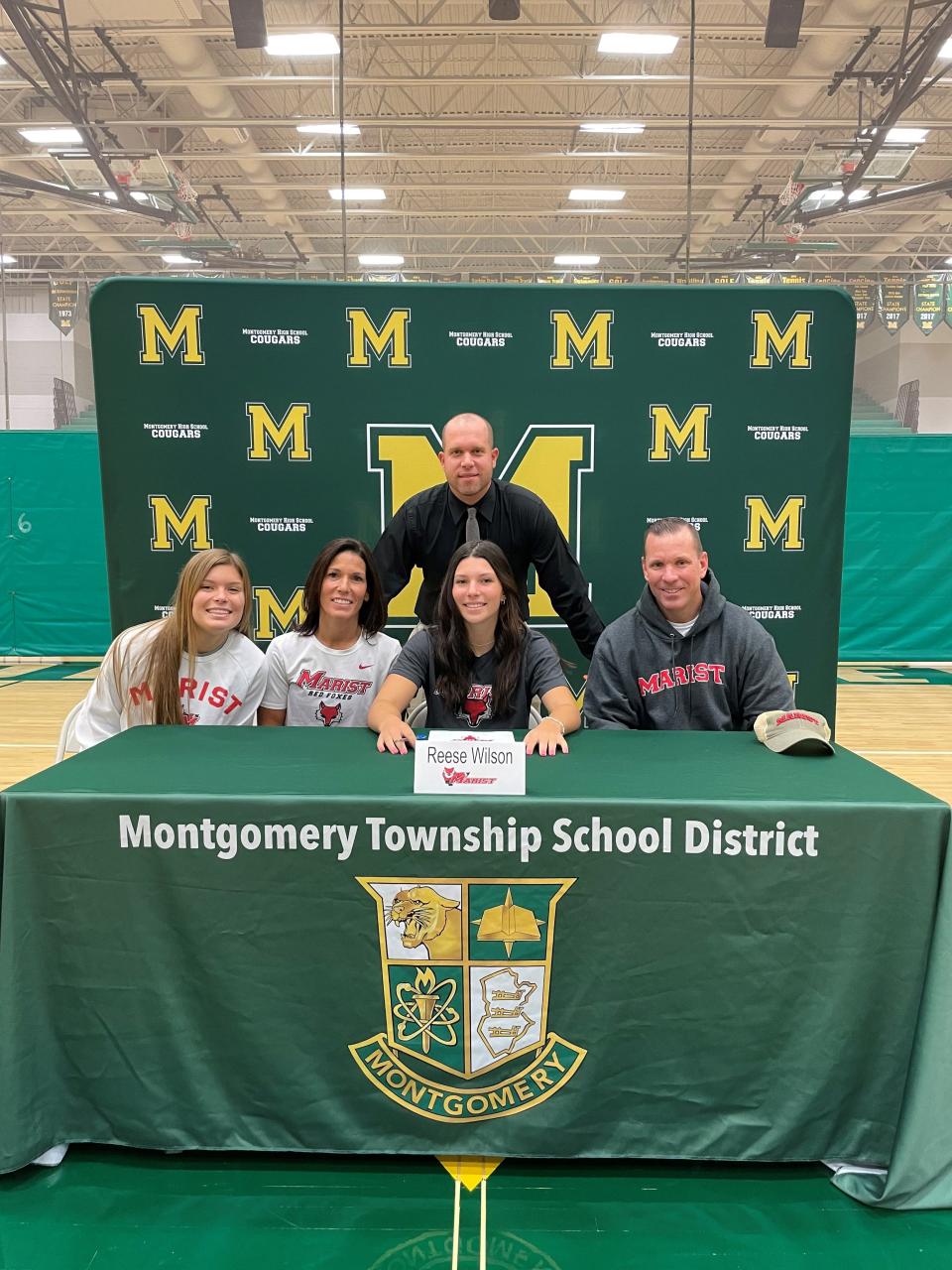 Montgomery's Reese Wilson signs her National Letter of Intent to play softball at Marist College on Wednesday, Nov. 10, 2021.