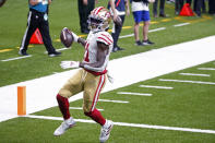 San Francisco 49ers wide receiver Brandon Aiyuk (11) crosses the goal line on a touchdown reception in the first half of an NFL football game against the New Orleans Saints in New Orleans, Sunday, Nov. 15, 2020. (AP Photo/Butch Dill)