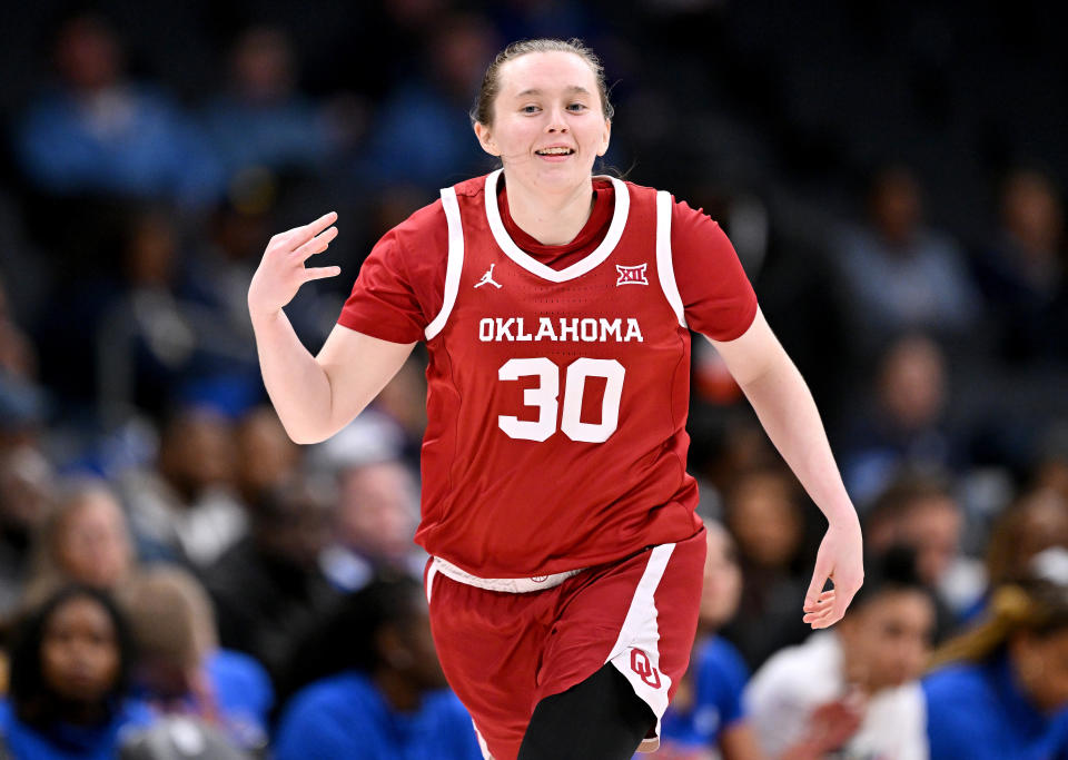 CHARLOTTE, NORTH CAROLINA - DECEMBER 21: Taylor Robertson #30 of the Oklahoma Sooners reacts after making a three-point basket against the Florida Gators during their game at Spectrum Center on December 21, 2022 in Charlotte, North Carolina. (Photo by Grant Halverson/Getty Images)