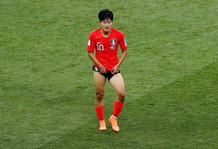 Soccer Football - World Cup - Group F - South Korea vs Mexico - Rostov Arena, Rostov-on-Don, Russia - June 23, 2018 South Korea's Lee Seung-woo looks dejected REUTERS/Darren Staples