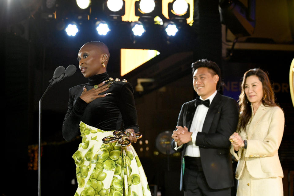 Cynthia Erivo accepts an award from Jon M. Chu and Michelle Yeoh on stage during Gold Gala 2024 at The Music Center on May 11, 2024 in Los Angeles.