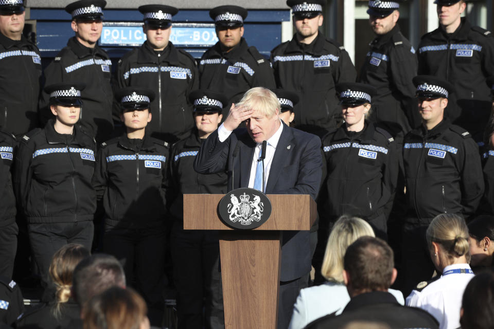 Britain's Prime Minister Boris Johnson makes a speech to police during a visit to West Yorkshire in England, Thursday, Sept. 5, 2019. Prime Minister Boris Johnson kept up his push Thursday for an early general election as a way to break Britain's Brexit impasse, as lawmakers moved to stop the U.K. leaving the European Union next month without a divorce deal. (Danny Lawson/PA via AP)