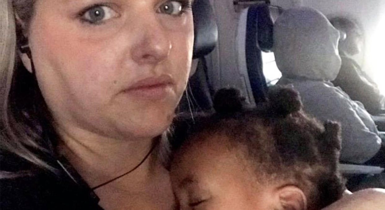 Stephanie Hollifield said a flight attendant made her feel better about flying with a fussy toddler. (Photo: Momstrosity via Facebook)