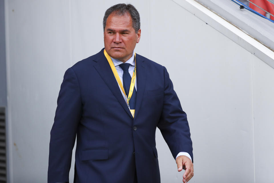 Australia's rugby coach Dave Rennie walks onto the field ahead of the Rugby Championship test match between the Springboks and the Wallabies in Brisbane, Australia, Saturday, Sept. 18, 2021. (AP Photo/Tertius Pickard)