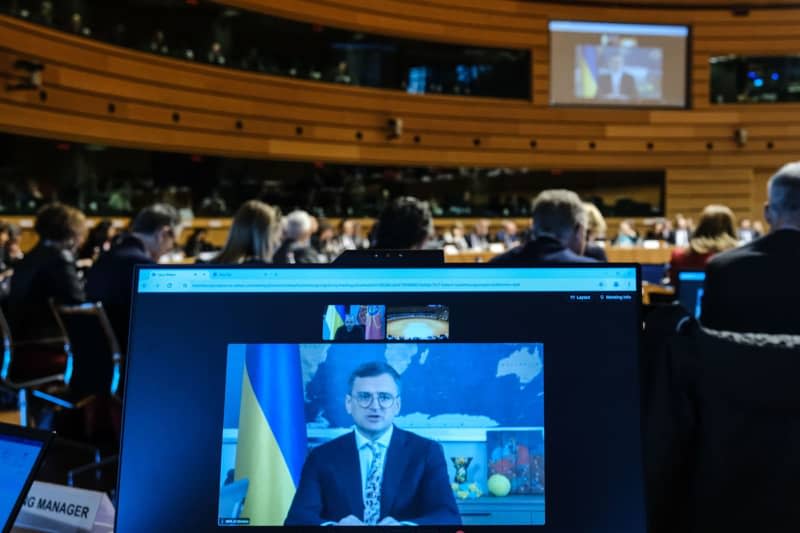 Minister of Foreign Affairs of Ukraine Dmytro Kuleba (on screen) speaks during the EU foreign and defence ministers meeting in Luxembourg. Alexandros Michailidis/European Council/dpa