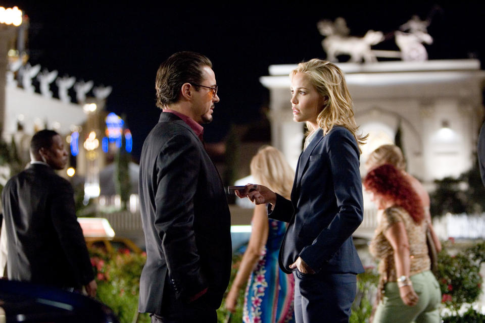 Leslie Bibb's Christine Everheart grills Robert Downey Jr.'s Tony Stark in <i>Iron Man</i> (2008)