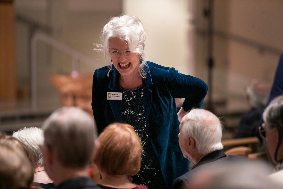 Steffanie Pearce greets friends in the audience before the start of the Gulfshore Opera's 10th Anniversary Celebration on Friday, Feb. 9, 2024, at Moorings Presbyterian Church in Naples.