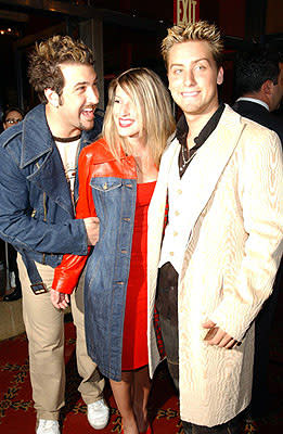 Joey Fatone with Lance Bass and his galpal at the New York premiere of On The Line