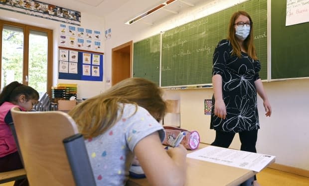 The six rapid response teams, created with $900,000 in funding, will conduct physical and virtual inspections of schools across the province to ensure health and safety guidelines are being consistently followed. (Frederick Florin/AFP/Getty Images - image credit)