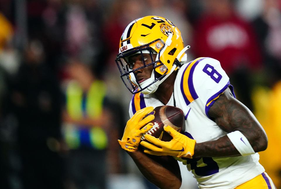 Nov 4, 2023; Tuscaloosa, Alabama, USA; LSU Tigers wide receiver Malik Nabers (8) hauls in a 46 yard pass for a touchdown against the Alabama Crimson Tide during the first quarter at Bryant-Denny Stadium. Mandatory Credit: John David Mercer-USA TODAY Sports