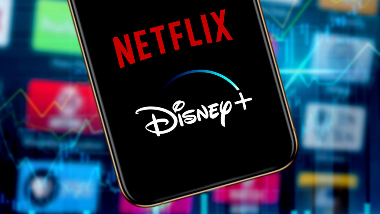  A phone showing the Netflix and Disney Plus logos 