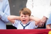 <p>Prince Louis pulls a face on the balcony of Buckingham Palace during the Platinum Jubilee flypast. (PA)</p> 