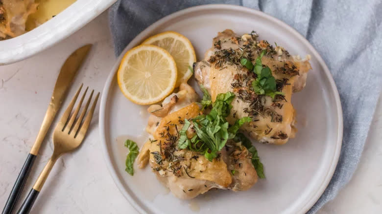 Italian chicken thighs on plate 