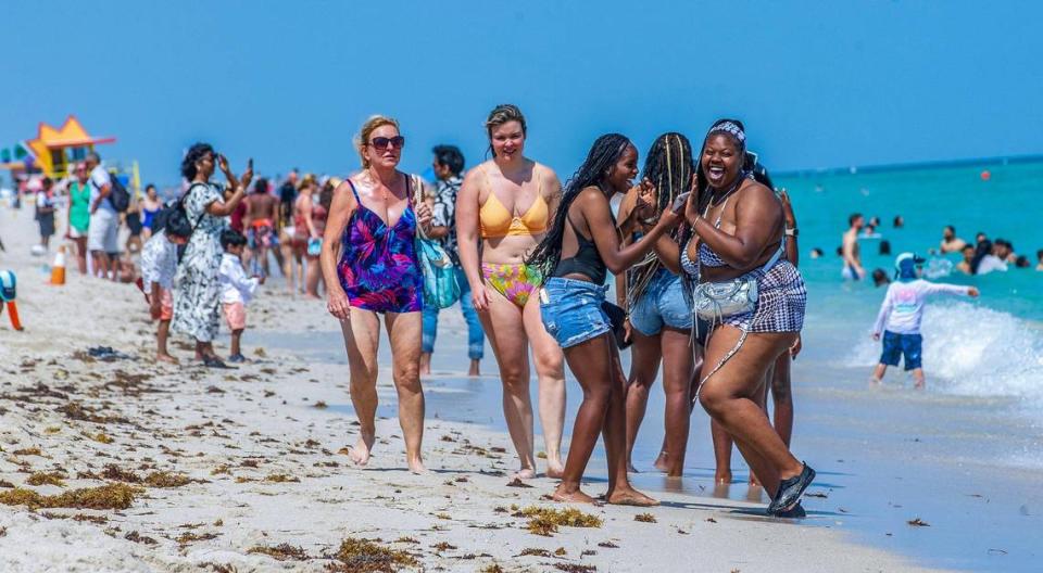 Beachgoers enjoy the beautiful weather during spring break in Miami Beach, on Saturday March 16, 2024.