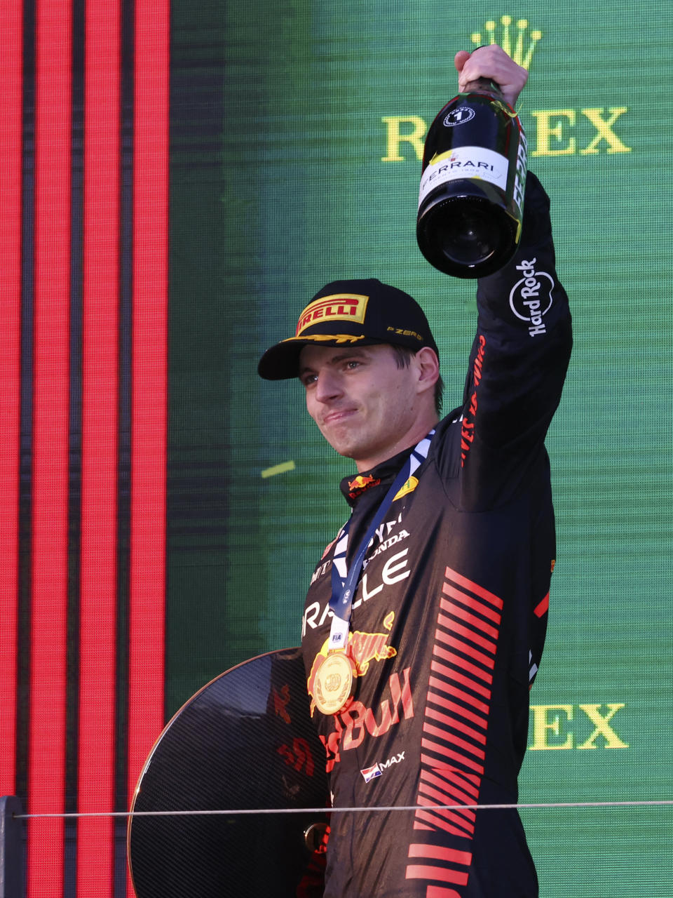 Red Bull driver Max Verstappen of Netherlands celebrates on the podium after winning the Australian Formula One Grand Prix at Albert Park in Melbourne, Sunday, April 2, 2023. (AP Photo/Asanka Brendon Ratnayake)