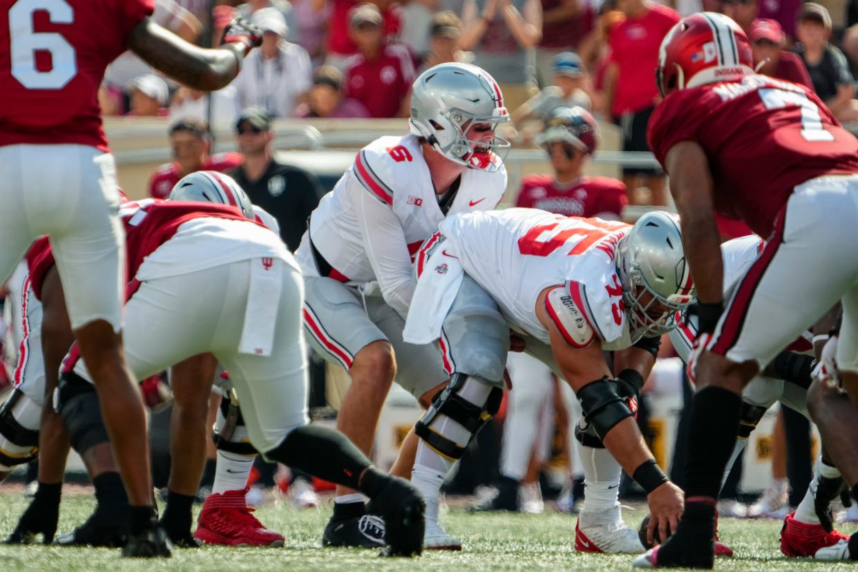 Sep 2, 2023; Bloomington, Indiana, USA; Ohio State Buckeyes quarterback Kyle McCord (6) lines up behind offensive lineman Carson Hinzman (75) during the NCAA football game at Indiana University Memorial Stadium. Ohio State won 23-3.