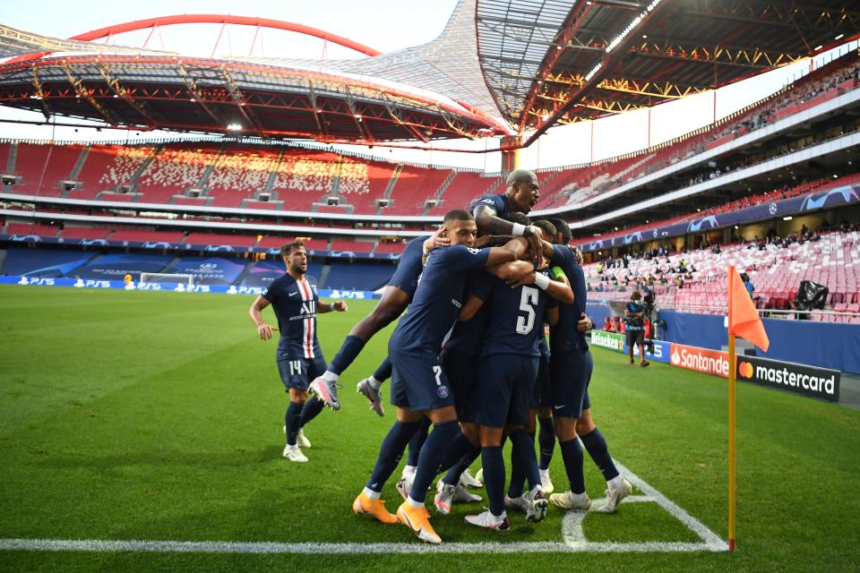 Paris Saint-Germain's Brazilian defender Marquinhos (C) celebrates with his teammates after scoring his team's first goal during the UEFA Champions League semi-final football match between Leipzig and Paris Saint-Germain at the Luz stadium in Lisbon on August 18, 2020. (Photo by David Ramos / POOL / AFP) (Photo by DAVID RAMOS/POOL/AFP via Getty Images)