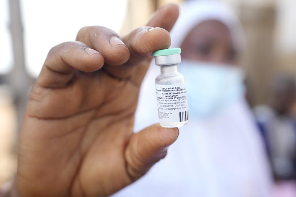 A health worker shows a cervical cancer vaccine HPV Gardasil, during a vaccination campaign on the street in Ibadan, Nigeria, on May 27, 2024. African countries have some of the world's highest rates of cervical cancer. Growing efforts to vaccinate more young girls for the human papillomavirus are challenged by the kind of vaccine hesitancy seen for some other diseases. Misinformation can include mistaken rumors that girls won't be able to have children in the future. Some religious communities must be told that the vaccine is "not ungodly." More than half of Africa's 54 nations – 28 – have introduced the vaccine in their immunization programs, but only five have reached the 90% coverage that the continent hopes to achieve by 2030. (AP Photo/Sunday Alamba)