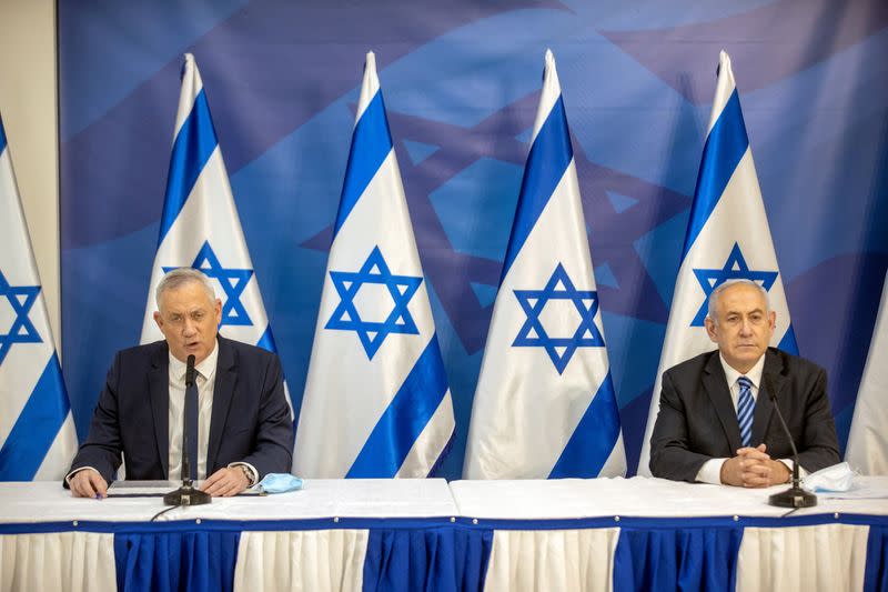 FILE PHOTO: Israeli PM Netanyahu and Alternate PM and Defence Minister Gantz issue statement in Tel Aviv