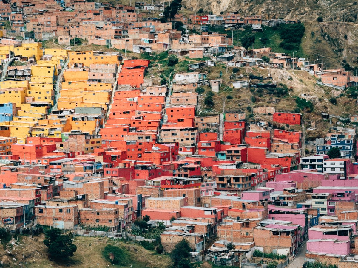 Colombia’s capital delights with market stalls, a rainbow of architecture and bean-to-cup coffee plants (Photo by Random Institute on Unsplash)