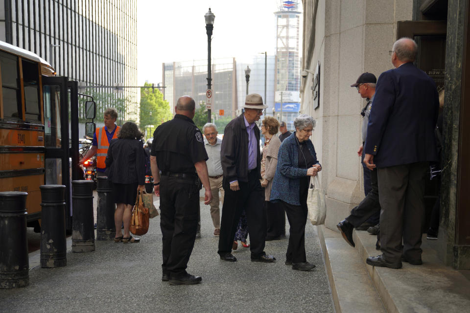 Members of Pittsburgh's Jewish community enter the Federal courthouse in Pittsburgh for the first day of trial for Robert Bowers, the suspect in the 2018 synagogue massacre on Tuesday, May 30, 2023, in Pittsburgh. Bowers could face the death penalty if convicted of some of the 63 counts he faces which claimed the lives of worshippers from three congregations who were sharing the building, Dor Hadash, New Light and Tree of Life. (AP Photo/Jessie Wardarski)