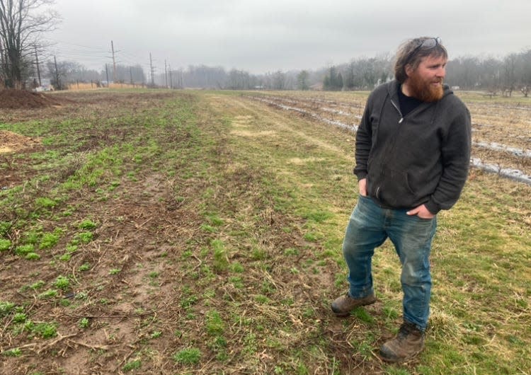 Farmer Tim Field stands on empty acreage at Styer Orchards in Middletown on Wednesday March 6, 2024. Field said he will plant almost 1,000 cherry, peach and apple trees. The plantings replace older tree stock that has aged out, and isn't easy to tend or harvest.