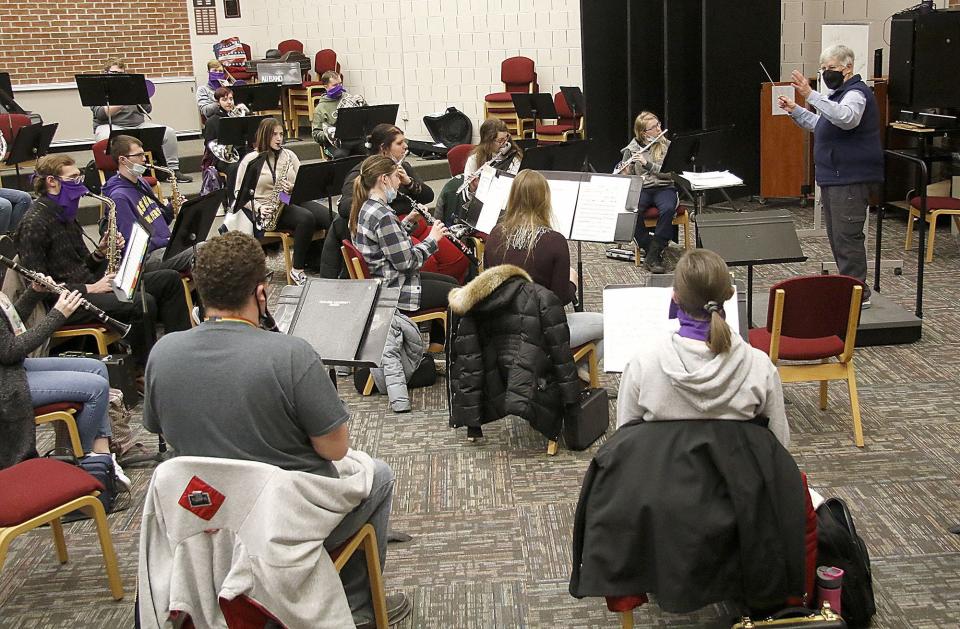 Ashland University interim band director Nancy Dittmer is seen during the Ashland University Symphonic Band's practice in the Elizabeth Pastor Recital Hall on Friday, Jan. 21, 2022. TOM E. PUSKAR/TIMES-GAZETTE.COM