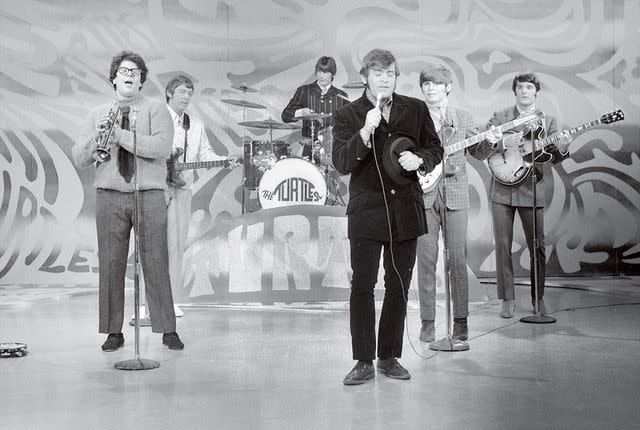 <p>CBS via Getty </p> The Turtles performing on The Ed Sullivan Show in 1967