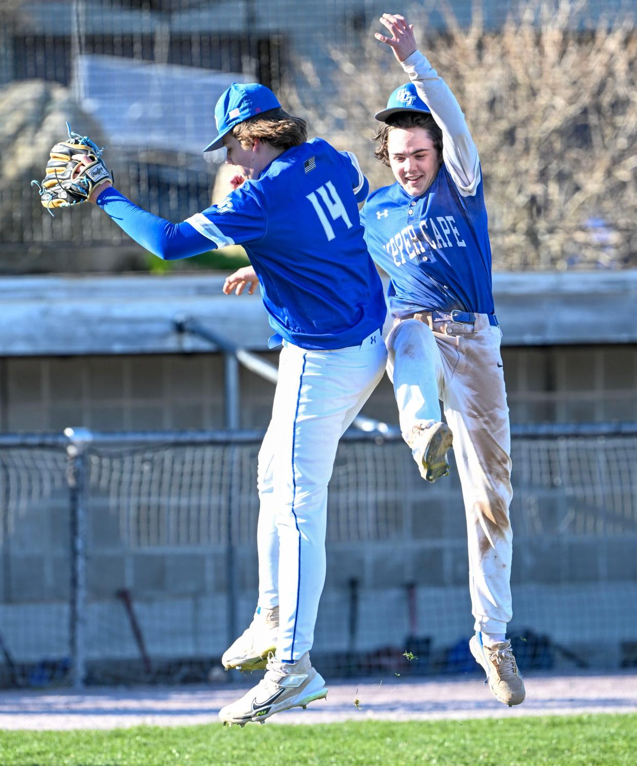 Upper Cape Tech closer Devyn Schulze (14) celebrates with Mitchell Kirkland after the last out in a 3-2 victory against Sturgis.