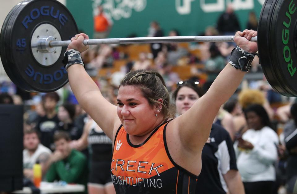 Spruce Creek High's Ava Jowdy makes a lift, Thursday February 1, 2024 during girls weightlifting regionals at Flagler Palm Coast High School.