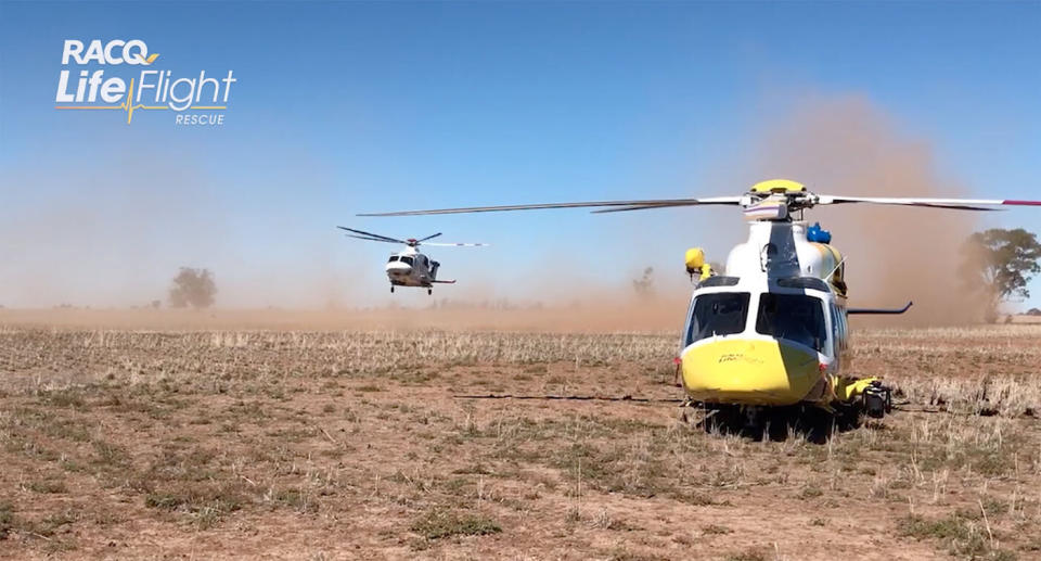 Two RACQ LifeFlight Rescue choppers arrived the farm, in the Western Downs region, Thursday morning. Source: RACQ LifeFlight Rescue