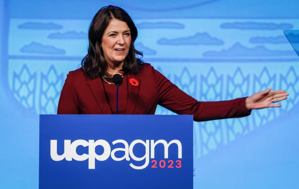 Alberta Premier Danielle Smith gestures as she speaks to party faithful at the United Conservative Party annual general meeting in Calgary, Saturday, Nov. 4, 2023.