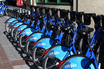 citi bikes are pictured in a row