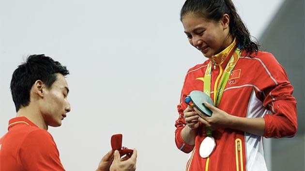 Chinese diver Qin Kai proposed to his girlfriend and fellow diver He Zi after she claimed silver in the 3m springboard final.