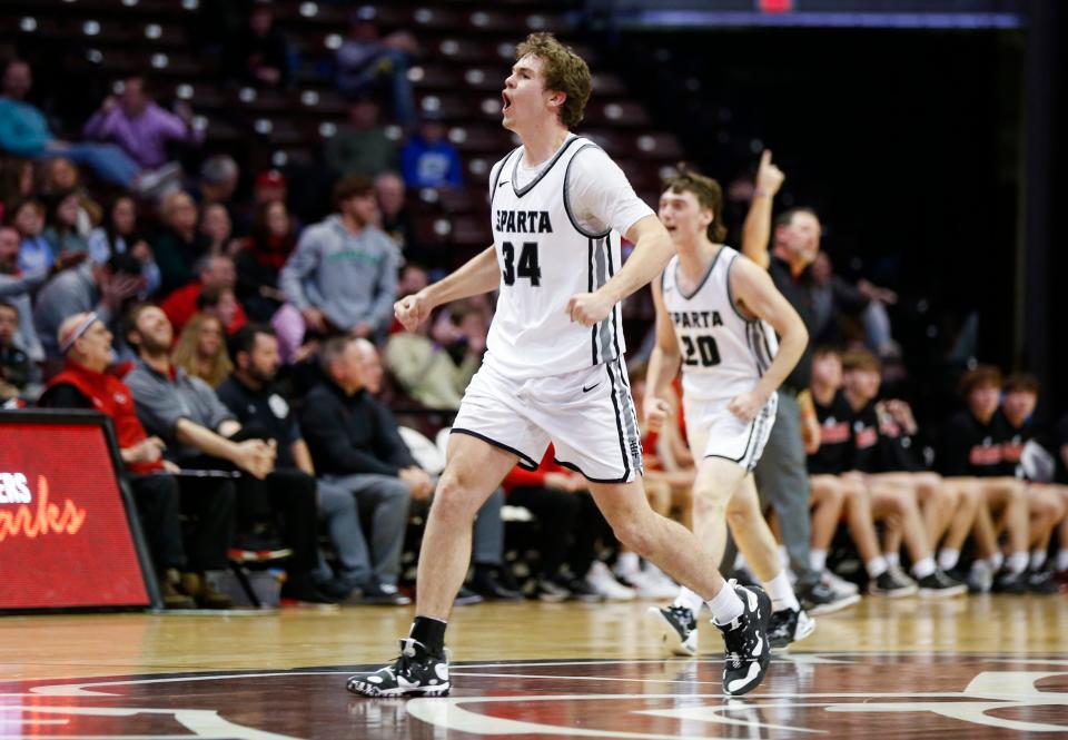 Sparta's Jacob Lafferty celebrates after the Trojans beat the Ozark Tigers in the Blue Division of the Blue & Gold Tournament at Great Southern Bank Arena on Tuesday, Dec. 27, 2022.