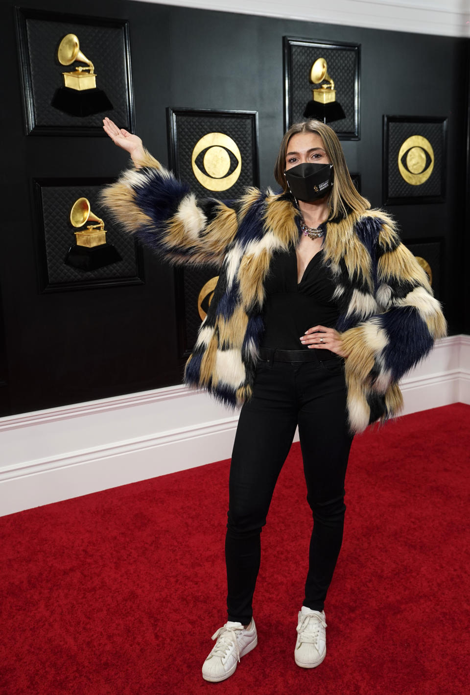 Associated Press entertainment reporter Marcela Isaza poses backstage at the 63rd Grammy Awards at the Los Angeles Convention Center, Thursday, March 11, 2021. The awards show will air on Sunday. (AP Photo/Chris Pizzello)