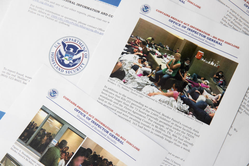 A portion of a report from government auditors reveals images of people penned into overcrowded Border Patrol facilities, photographed Tuesday, July 2, 2019, in Washington. The report released Tuesday by the Department of Homeland Security's Office of Inspector General warns that facilities in South Texas' Rio Grande Valley face "serious overcrowding" and require "immediate attention." (AP Photo/Andrew Harnik)