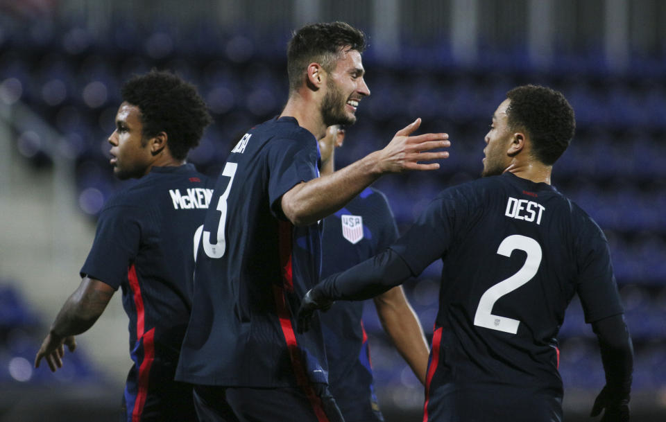 United States' Matt Miazga and Sergino Dest celebrate during a friendly match against Panama.