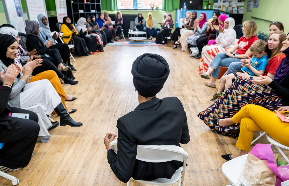 Rep. Ilhan Omar meets with community members at the RISE (Reviving Sisterhood) office in North Minneapolis on April 24, 2019. RISE is a nonprofit organization that works to cultivate leadership and civic engagement among Muslim women. (Photo: Caroline Yang for HuffPost)