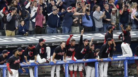 Sep 14, 2017; Cleveland, OH, USA; Cleveland Indians players and fans celebrate after shortstop Francisco Lindor (not pictured) RBI double in the ninth inning against the Kansas City Royals at Progressive Field. Mandatory Credit: David Richard-USA TODAY Sports