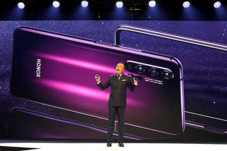 FILE PHOTO: President of Huawei's Honor brand, George Zhao, launches the Honor 20 range of smartphones at an event in London, Britain, May 21, 2019. REUTERS/Peter Nicholls/File Photo