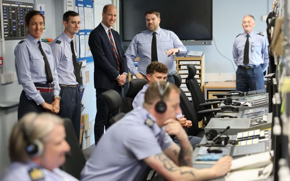 Prince William meets personnel in the control tower at RAF Valley