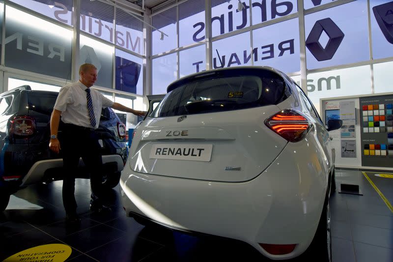 Steve Tomlin shows the new version of Renault's small battery electric Zoe model car in Reading