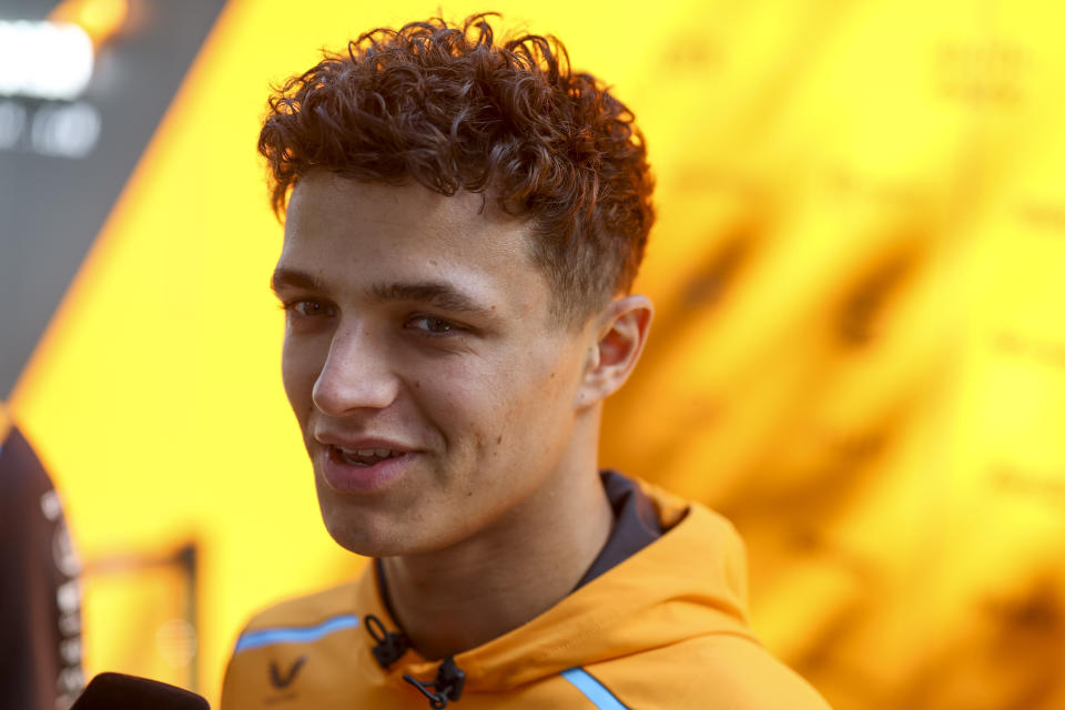 McLaren driver Lando Norris of Britain is interviewed ahead of the Australian Formula One Grand Prix at Albert Park, Melbourne, Australia, Thursday, March 21, 2024. (AP Photo/Asanka Brendon Ratnayake)