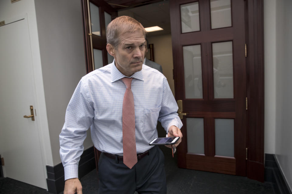 FILE - In this July 28, 2017 file photo, Rep. Jim Jordan, R-Ohio, a key member and founder of the conservative Freedom Caucus, emerges from a House Republican Conference meeting on Capitol Hill in Washington. Republicans lost their majority in this week's midterm elections, and conservatives are blaming the GOP establishment and angling for changes. Kevin McCarthy burned up the phone lines Thursday, Nov. 8, 2018, shoring up support to be minority leader. He's facing a challenge from Jordan, who's part of the conservative Freedom Caucus. (AP Photo/J. Scott Applewhite, File)