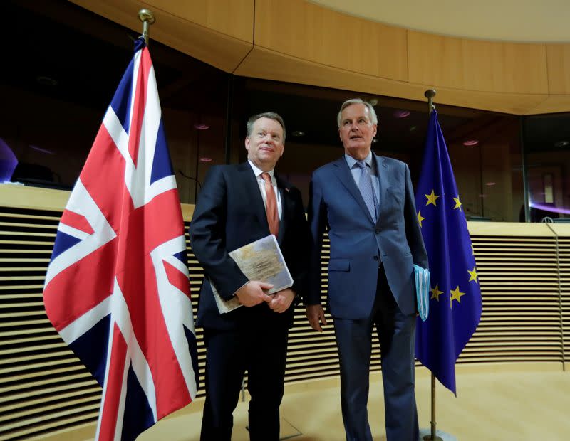 FILE PHOTO: European Union chief Brexit negotiator Michel Barnier and British Prime Minister's Europe adviser David Frost 5 are seen at start of the first round of post -Brexit trade deal talks