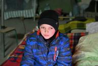 'I didn't really understand what was happening, I thought it would end the next day,' says Daniel, 13 (AFP/SERGEY BOBOK)